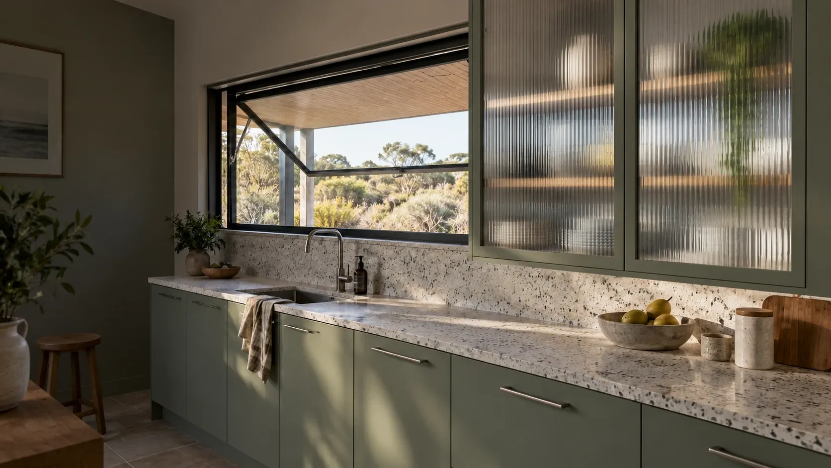 Architectural concept of reeded cabinet glass in a green kitchen